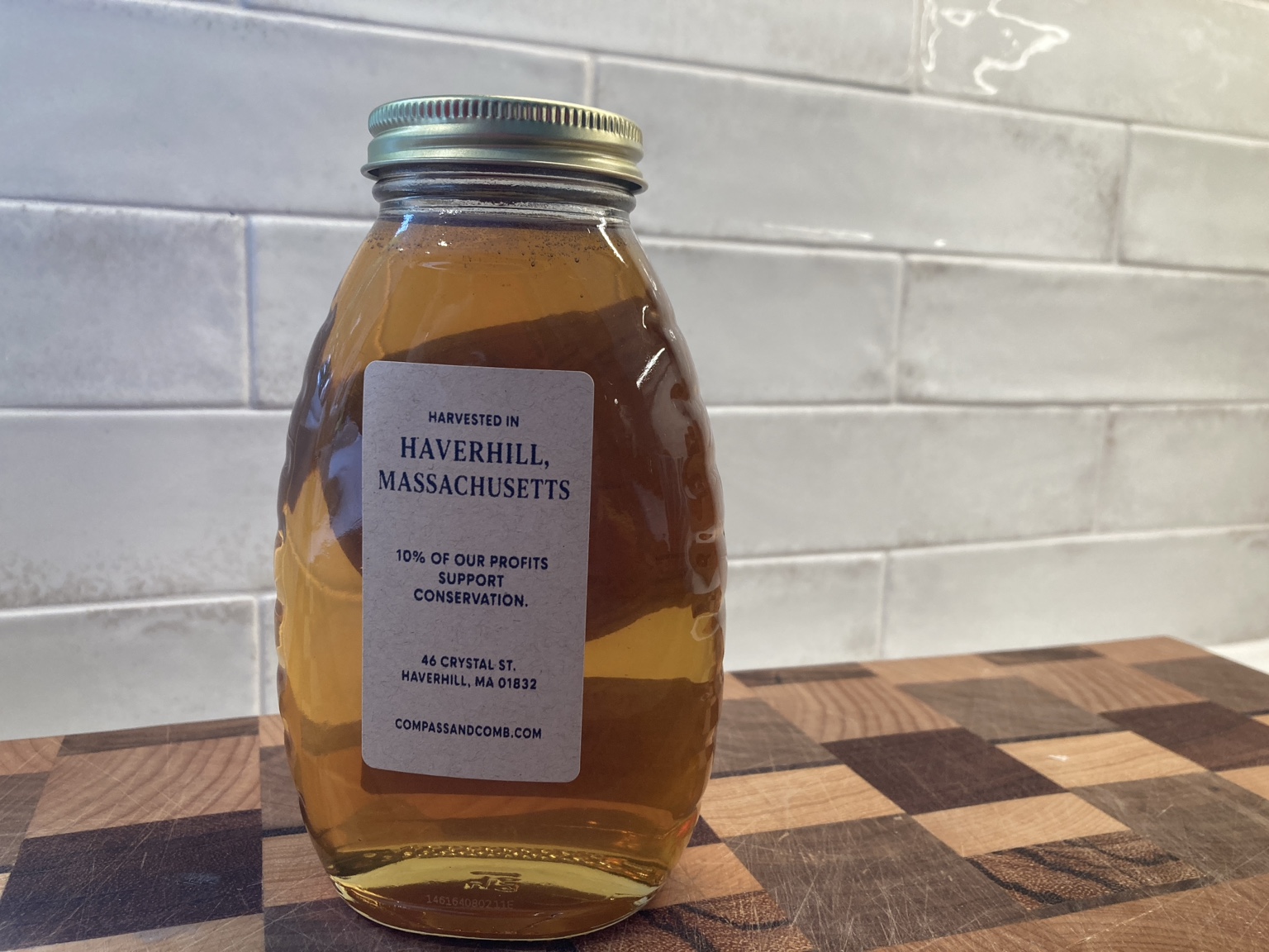 Back label of Compass and Comb honey showing its Haverhill origin and conservation commitment